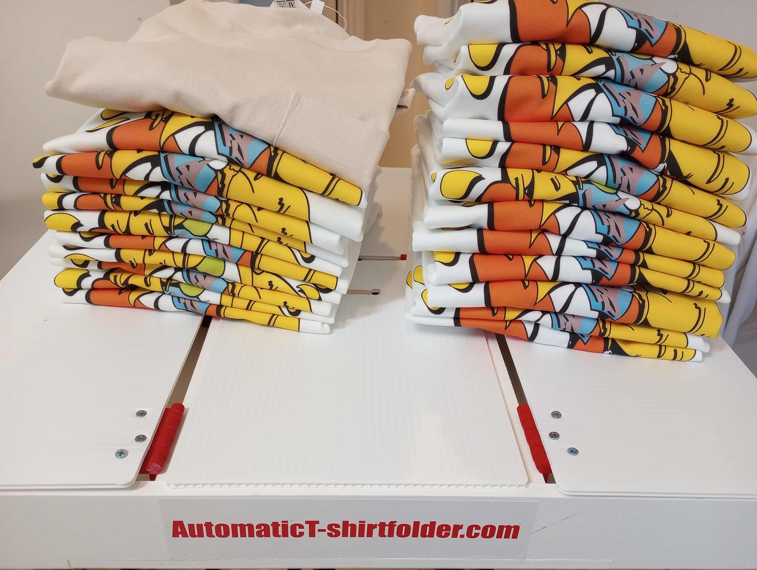 Automatic T-shirt folder
